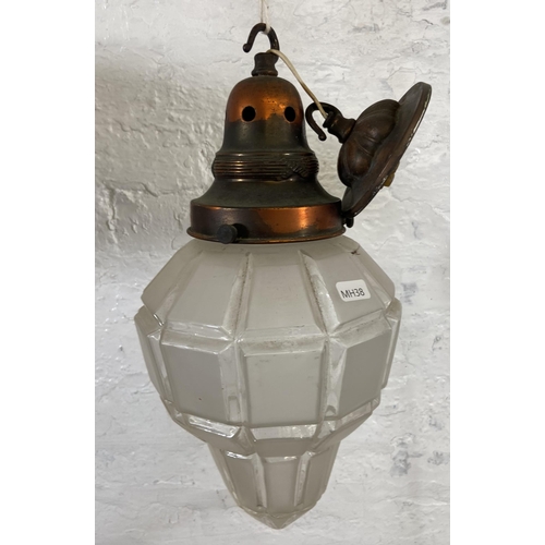 114 - An early 20th century copper and frosted glass pendant light - approx. 36cm high