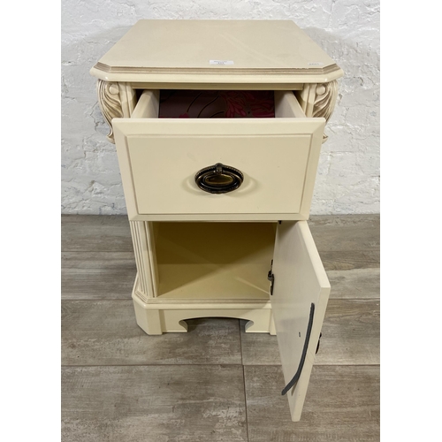 121 - A French style white painted bedside cabinet - approx. 63cm high x 40cm wide x 46cm deep