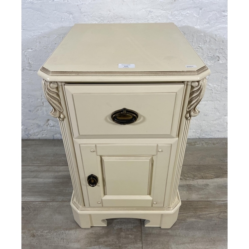 121 - A French style white painted bedside cabinet - approx. 63cm high x 40cm wide x 46cm deep