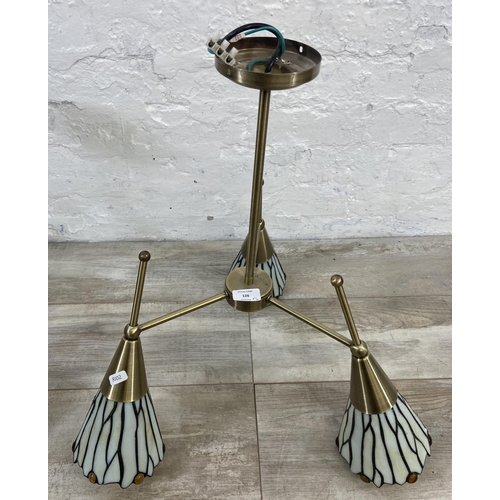 126 - Four pieces of Tiffany style brushed brass effect and stained glass lighting, two chandeliers and tw... 