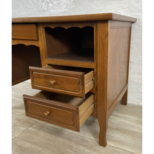 127 - A beech office desk - approx. 77cm high x 110cm wide x 64cm deep