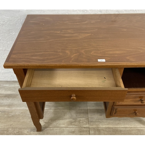 127 - A beech office desk - approx. 77cm high x 110cm wide x 64cm deep