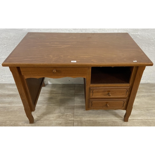 127 - A beech office desk - approx. 77cm high x 110cm wide x 64cm deep