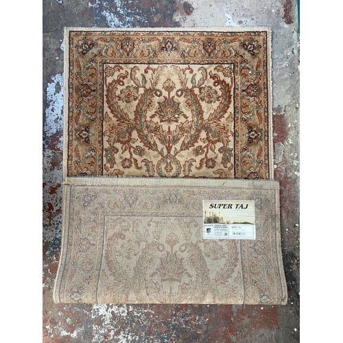 13 - A Wools of New Zealand Super Taj 100% wool pile floral pattern rug - approx. 156cm x 83cm