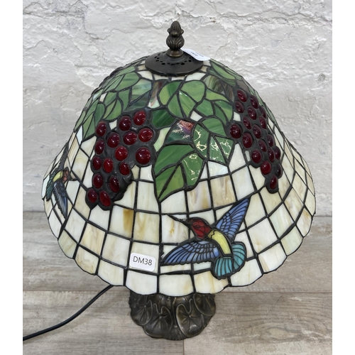 130 - A Tiffany style table lamp - approx. 46cm high