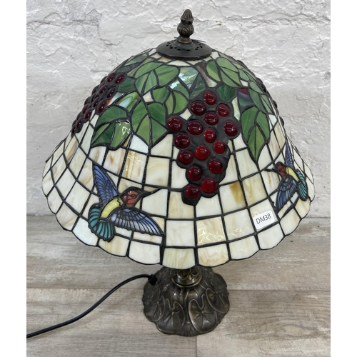 130 - A Tiffany style table lamp - approx. 46cm high