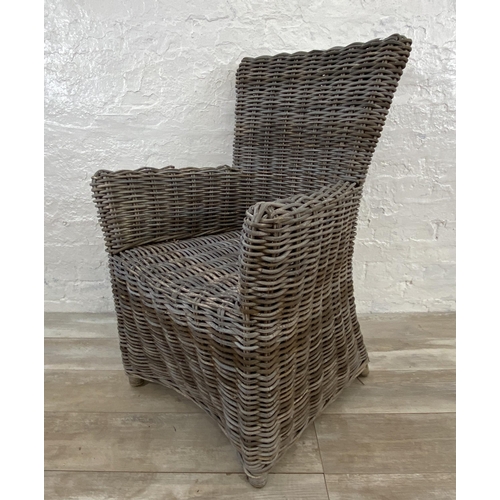 132 - Six wicker garden armchairs