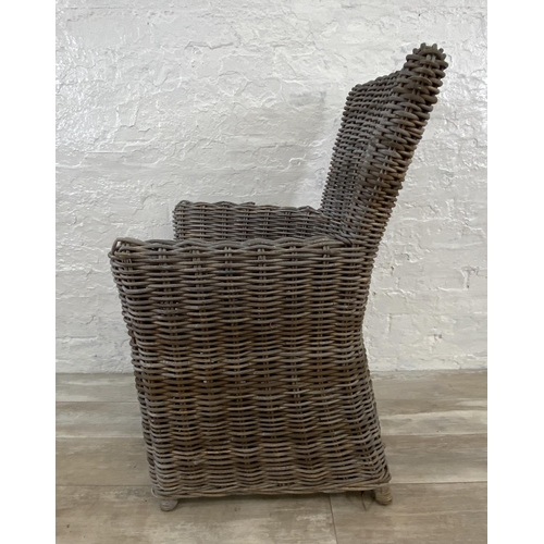 132 - Six wicker garden armchairs