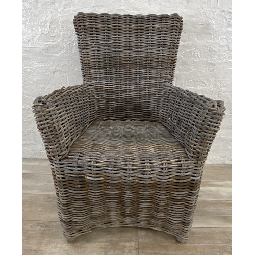 132 - Six wicker garden armchairs