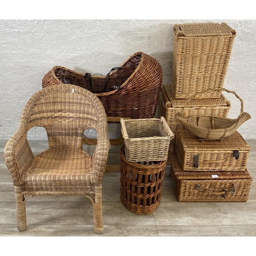 134 - Nine pieces of wicker furniture to include armchair, Moses basket etc.