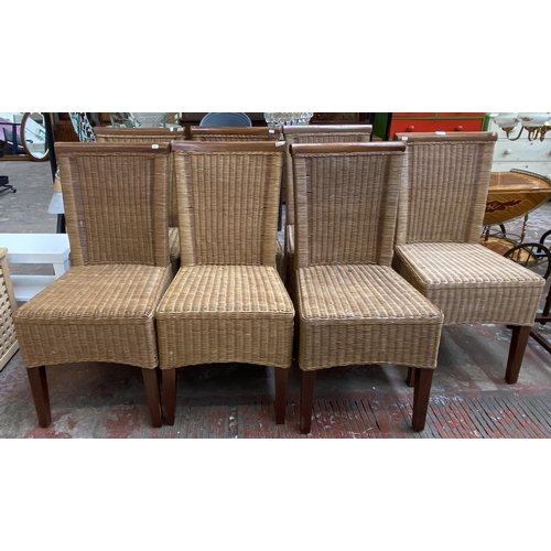 137 - Seven wicker and hardwood dining chairs