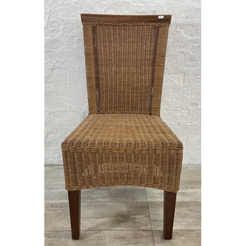 137 - Seven wicker and hardwood dining chairs