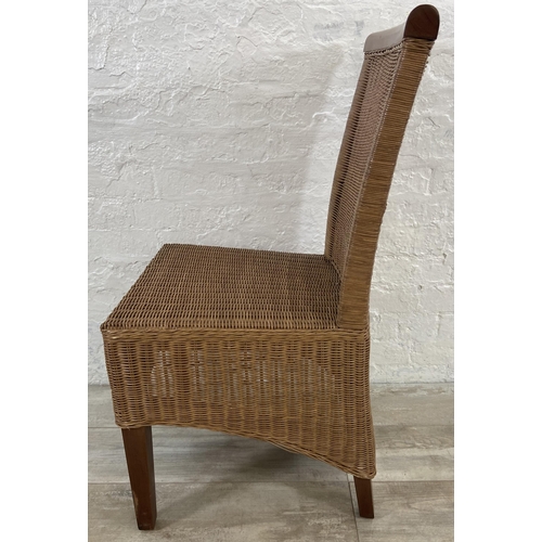 137 - Seven wicker and hardwood dining chairs