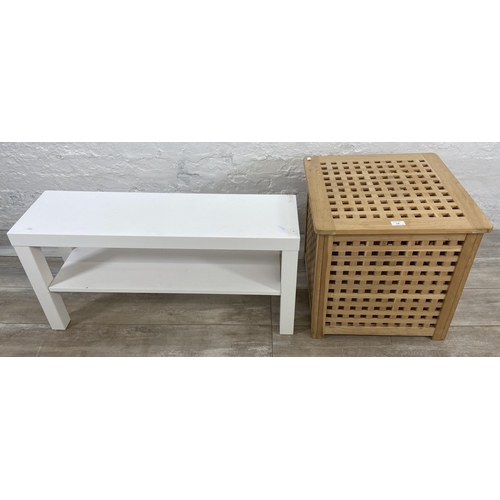 138 - Two pieces of modern furniture, one IKEA Lack white laminate bench and one beech laundry basket