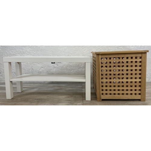 138 - Two pieces of modern furniture, one IKEA Lack white laminate bench and one beech laundry basket