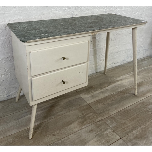 139 - A mid 20th century white painted dressing table - approx. 72cm high x 106cm wide x 46cm deep