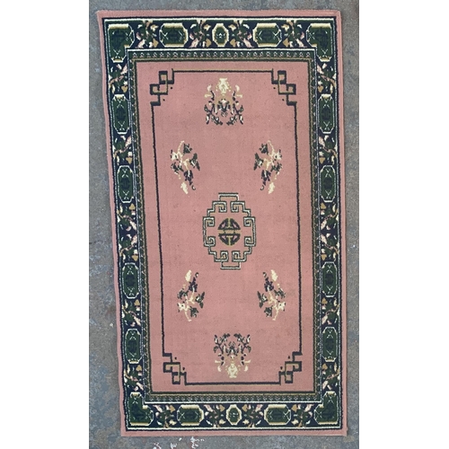 13A - A Kashan 100% polypropylene pink ground rug - approx. 150cm x 82cm