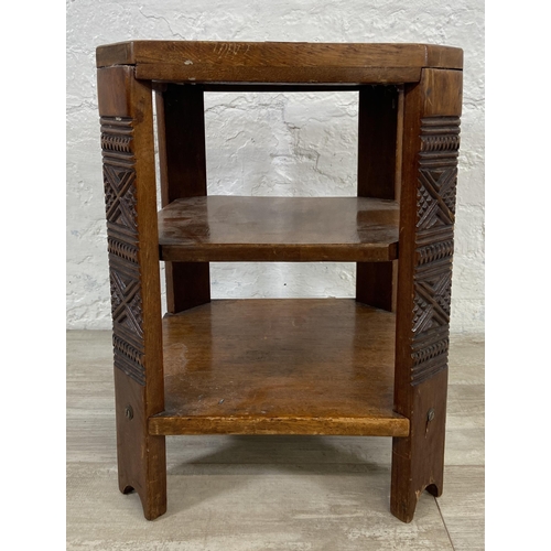 140 - A 1930s carved wood octagonal three tier side table - approx. 48cm high x 35cm wide x 35cm deep