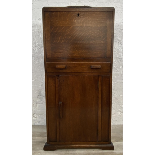 141 - An Art Deco oak bureau - approx. 108cm high x 56cm wide x 33cm deep