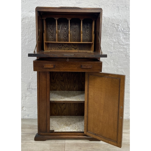 141 - An Art Deco oak bureau - approx. 108cm high x 56cm wide x 33cm deep