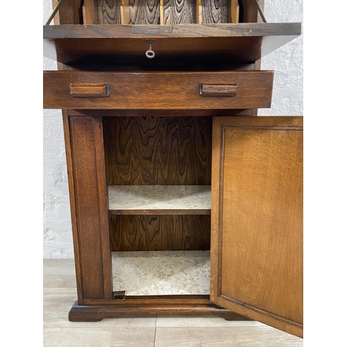 141 - An Art Deco oak bureau - approx. 108cm high x 56cm wide x 33cm deep