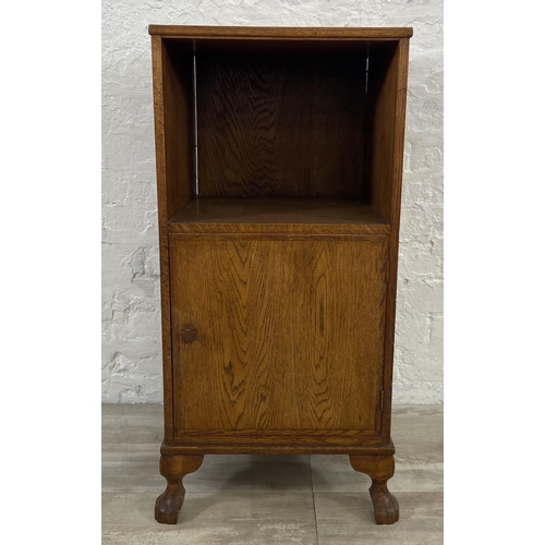 143 - A mid 20th century oak bedside cabinet - approx. 86cm high x 41cm wide x 41cm deep