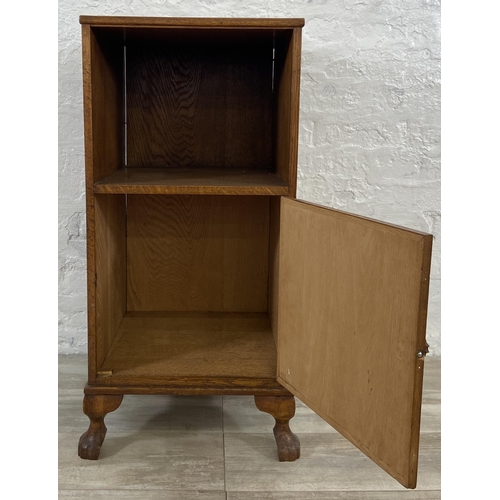 143 - A mid 20th century oak bedside cabinet - approx. 86cm high x 41cm wide x 41cm deep