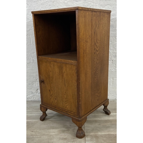 143 - A mid 20th century oak bedside cabinet - approx. 86cm high x 41cm wide x 41cm deep