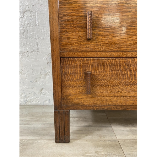 145 - An Art Deco oak chest of drawers - approx. 10cm high x 70cm wide x 43cm deep