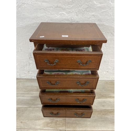 148 - A Georgian style inlaid mahogany miniature chest of drawers on bracket supports - approx. 74cm high ... 