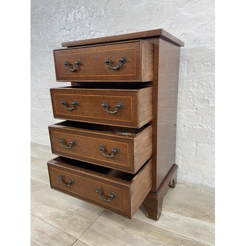 148 - A Georgian style inlaid mahogany miniature chest of drawers on bracket supports - approx. 74cm high ... 