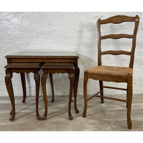 149 - Two pieces of furniture, one Queen Anne style burr walnut nest of three tables and one French style ... 