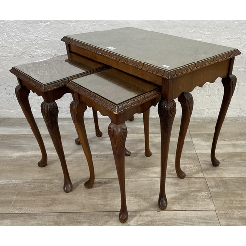 149 - Two pieces of furniture, one Queen Anne style burr walnut nest of three tables and one French style ... 