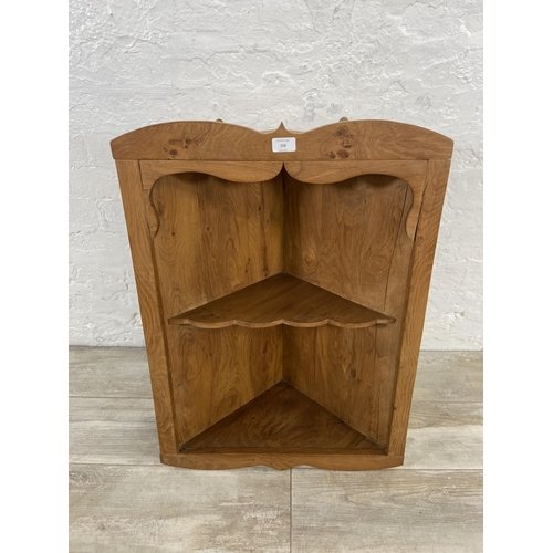 150 - An oak wall hanging two tier corner shelving unit - approx. 78cm high 56cm wide x 29cm deep