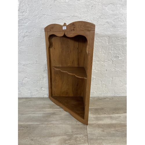 150 - An oak wall hanging two tier corner shelving unit - approx. 78cm high 56cm wide x 29cm deep