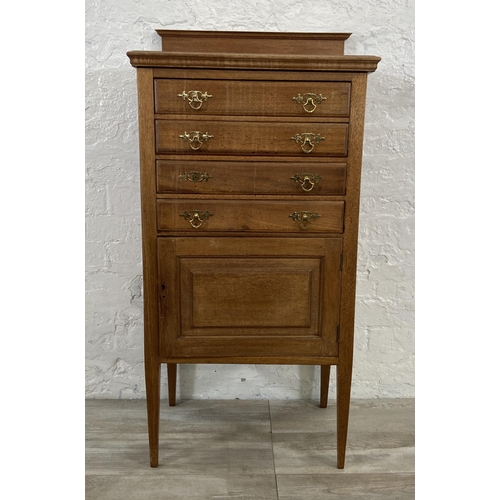 153 - An Edwardian mahogany four drawer music cabinet - approx. 110cm high x 55cm wide x 38cm deep