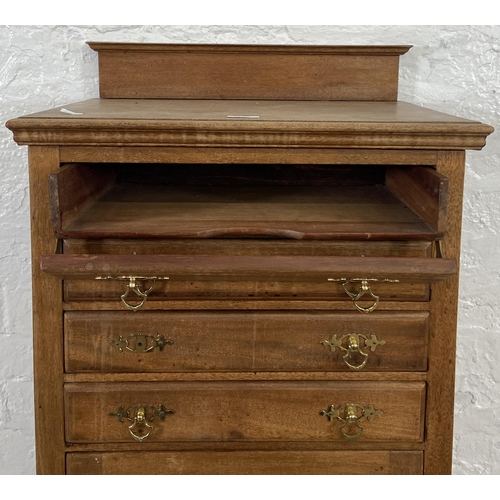 153 - An Edwardian mahogany four drawer music cabinet - approx. 110cm high x 55cm wide x 38cm deep