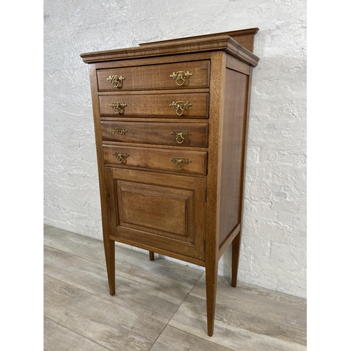 153 - An Edwardian mahogany four drawer music cabinet - approx. 110cm high x 55cm wide x 38cm deep