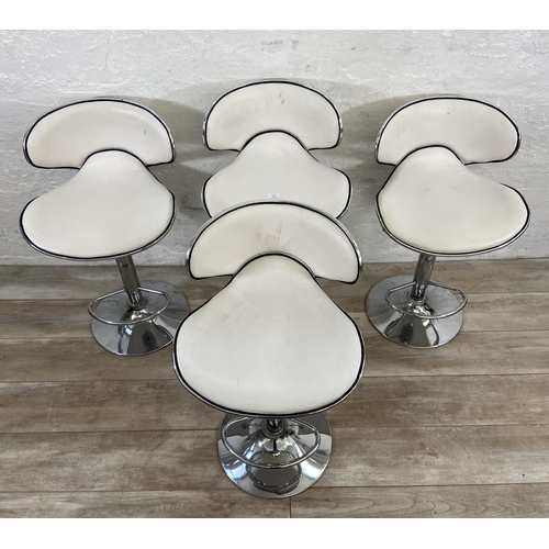 156 - Four modern chrome plated and white leatherette height adjustable kitchen bar stools