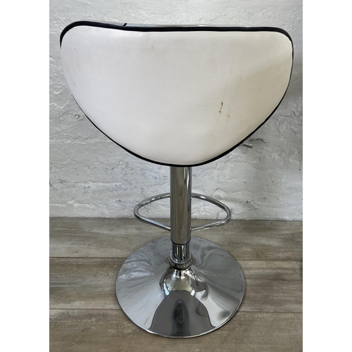 156 - Four modern chrome plated and white leatherette height adjustable kitchen bar stools