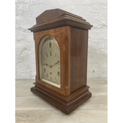 18 - An early 20th century inlaid mahogany cased silent chime mantel clock with German No. 6713 movement ... 