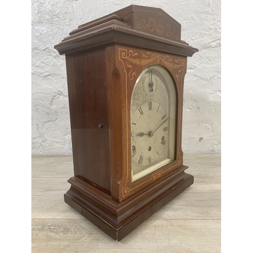 18 - An early 20th century inlaid mahogany cased silent chime mantel clock with German No. 6713 movement ... 