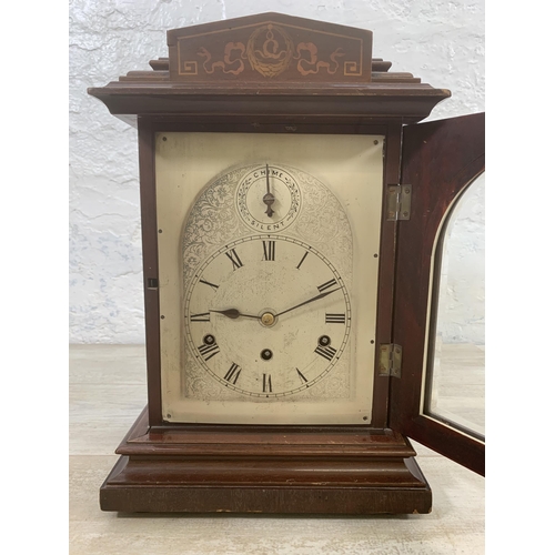 18 - An early 20th century inlaid mahogany cased silent chime mantel clock with German No. 6713 movement ... 