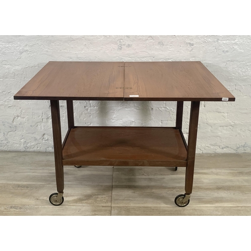 2 - A mid 20th century teak fold out two tier cocktail trolley - approx. 63cm high x 70cm wide x 90cm lo... 