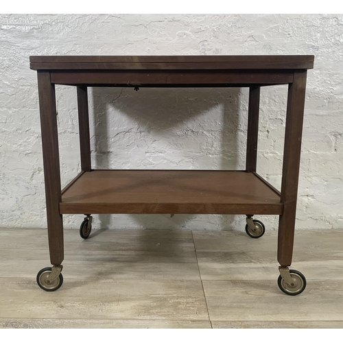 2 - A mid 20th century teak fold out two tier cocktail trolley - approx. 63cm high x 70cm wide x 90cm lo... 