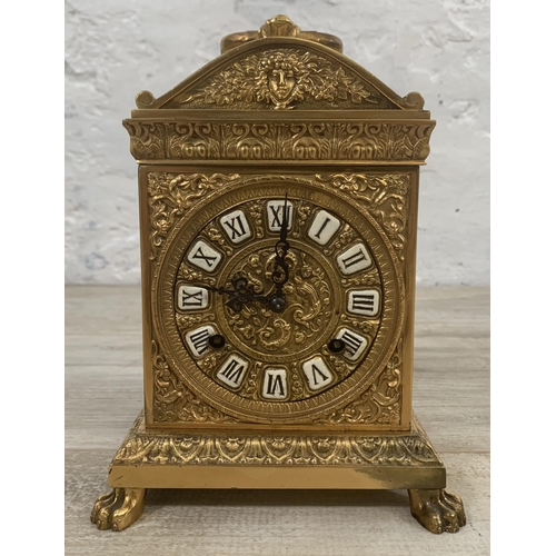 21 - A French style brass cased chiming mantel clock with winder - approx. 20cm high x 15cm wide x 11cm d... 