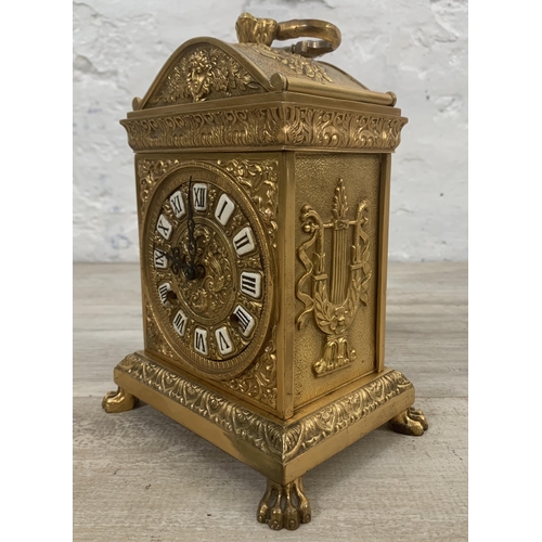 21 - A French style brass cased chiming mantel clock with winder - approx. 20cm high x 15cm wide x 11cm d... 