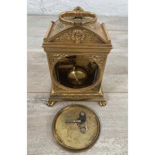 21 - A French style brass cased chiming mantel clock with winder - approx. 20cm high x 15cm wide x 11cm d... 