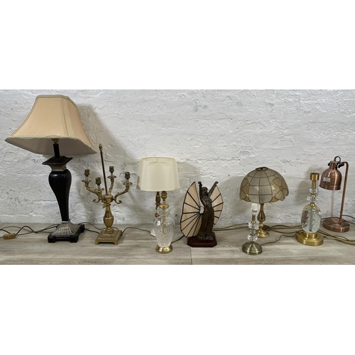 31 - Nine table lamps to include gilt metal and marble, Dunelm copper effect, bronzed resin figural with ... 