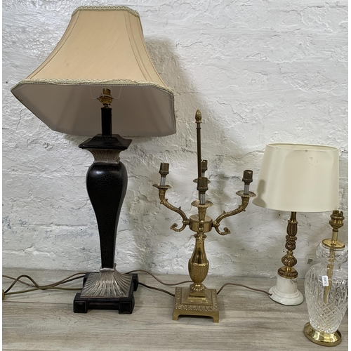 31 - Nine table lamps to include gilt metal and marble, Dunelm copper effect, bronzed resin figural with ... 